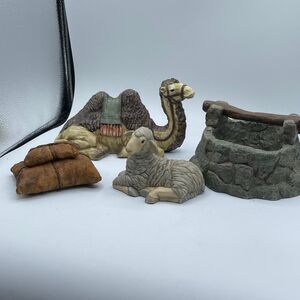 O’Well 4 piece nativity pieces. Camel-well-pillows lamb.